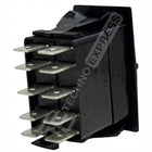 Rear view of ACC 1/2 electrical switch showing plastic housing, mounting flange and eight spade terminals