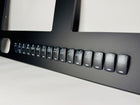 Side-angle close-up of Cobia 277 dash panel showing labeled rocker switches and gauge cutouts