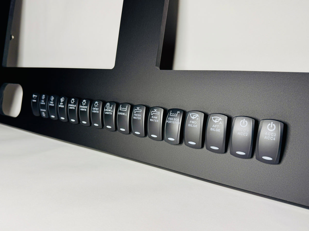 Side-angle close-up of Cobia 277 dash panel showing labeled rocker switches and gauge cutouts
