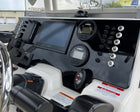 Robalo R222 dash panel angled view showing Garmin display, Yamaha gauges, toggle switches.