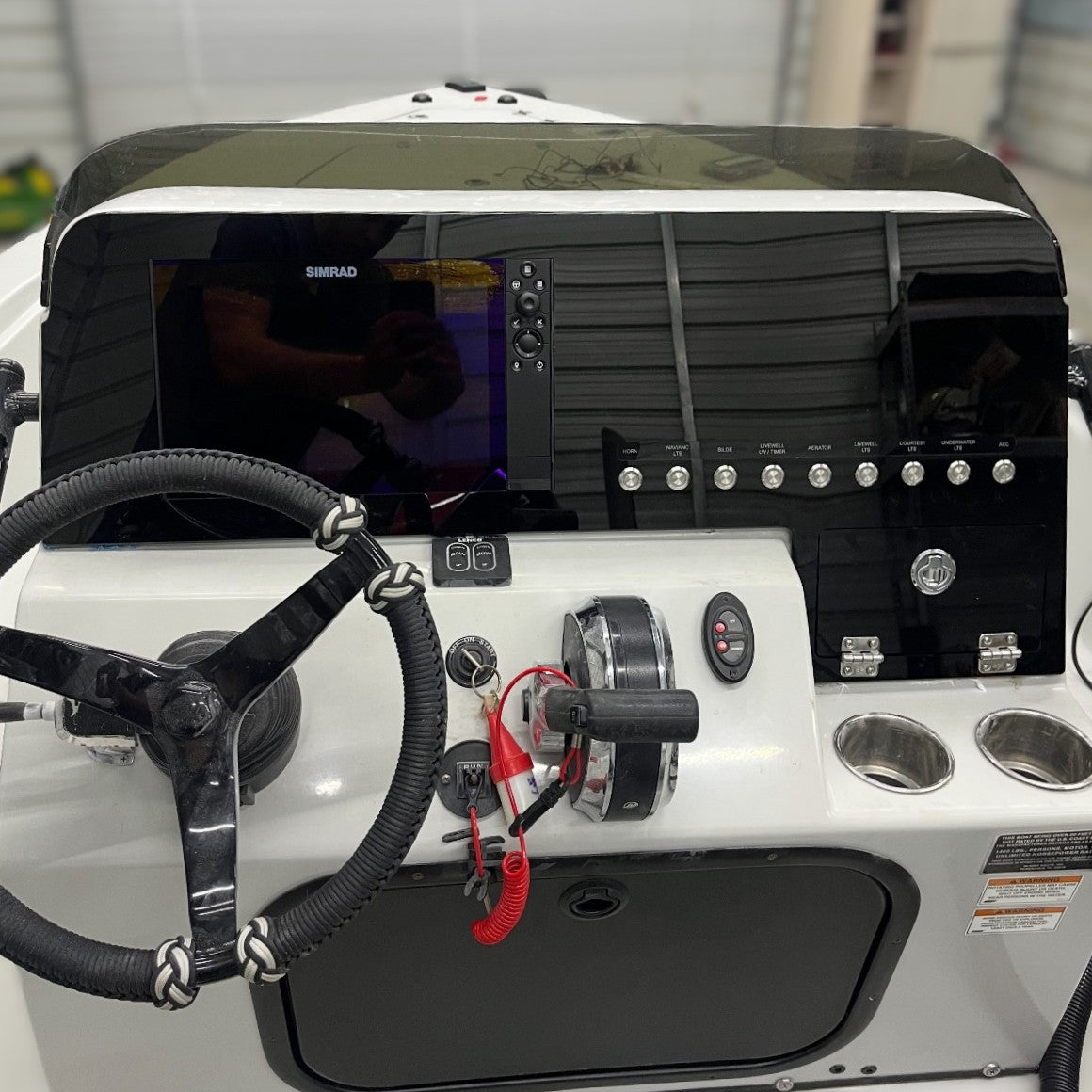 BLAZER 675 dash front, black acrylic Simrad cutout, switch row, throttle, ignition w/ red lanyard, glove box