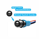 Round metal panel switch with black etched cap reading LIVEWELL AFT and fish icon, blue connector and wires