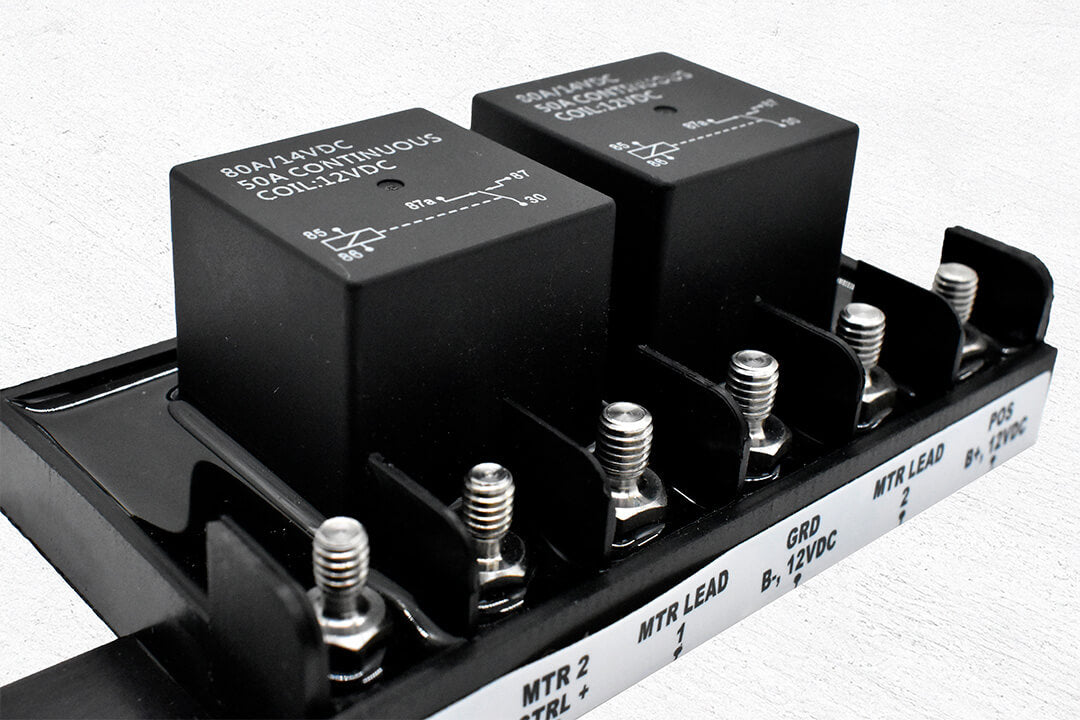 Bluewater forward/reverse relay module rear terminal close-up showing screw posts, labels
