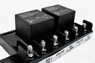 Bluewater forward/reverse relay module rear terminal close-up showing screw posts, labels